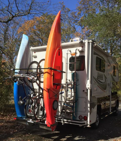 Sale good until 3/18/26 SAVE $300! Yakups®   Model KR2B56 rack can be used with  SWING ARMS on class B  RV's or Truck Campers, Includes Bike Rack, Kayak stainless guards, & Drop down wheel.  SEE VIDEO - Image 13